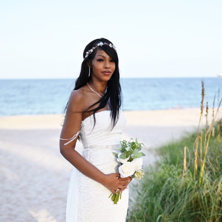Mother of the bride & bride  posing at Wedding Day Romance in Pinecrest Florida