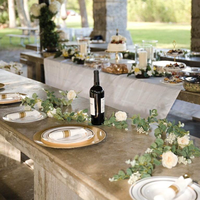 Elegant outdoor dining setup with floral decor for  your wedding at Matheson Hammocks