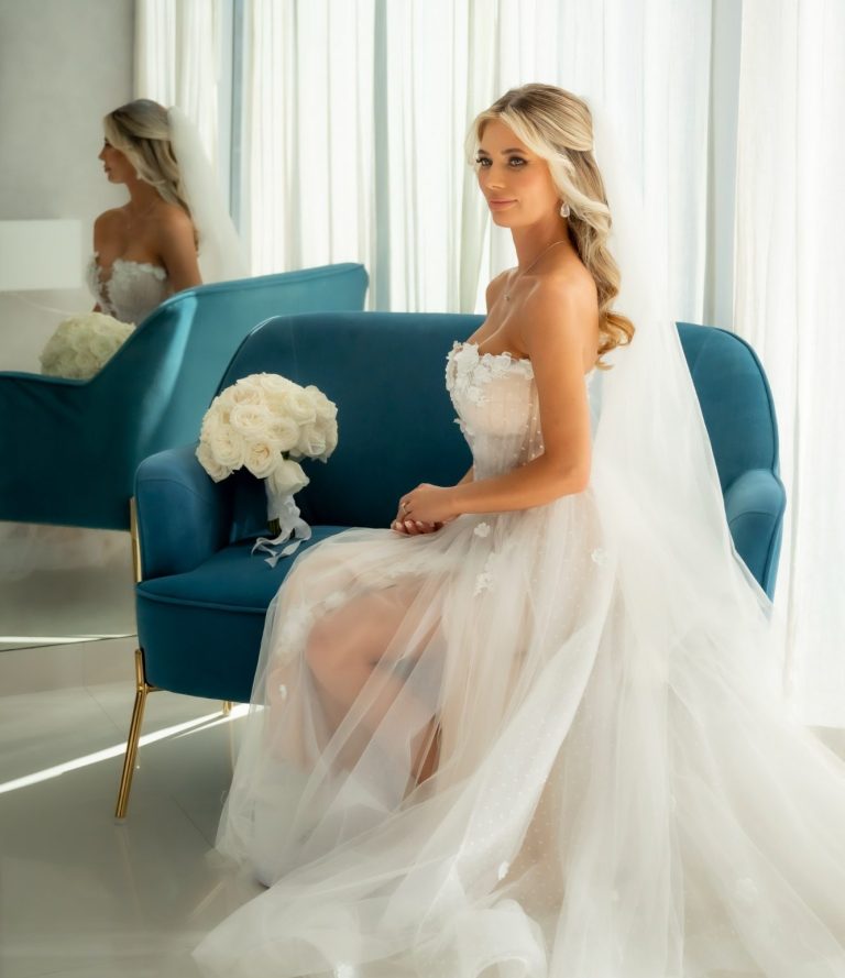 Bride in her wedding gown with a bridal bouquet by Iris Ramil - at the W Hotel in Miami