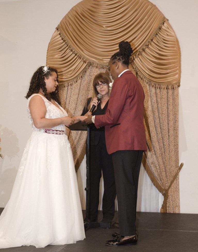 Wedding couple exchanging vows during a wedding ceremony at Renaissance Ballrooms on 8th Street Miami