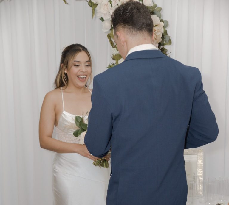 Bride & Groom standing together on a pathway in Key Largo, Florida